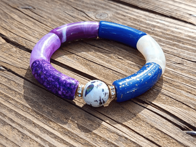 Bracelet perles tubes incurvées acrylique Uma Raaka