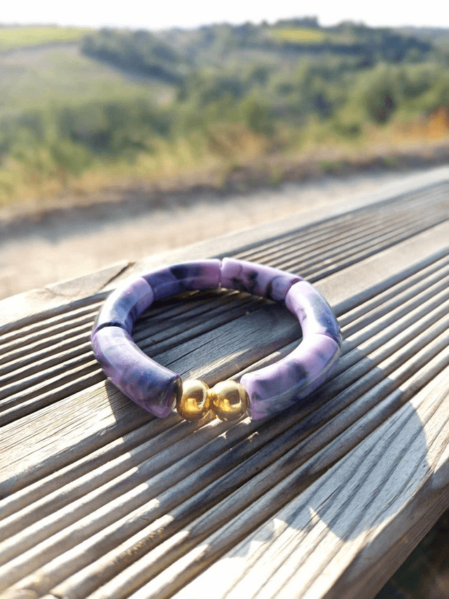 Bracelet perles tubes incurvées acryliques marbrées Khazaana Mauve