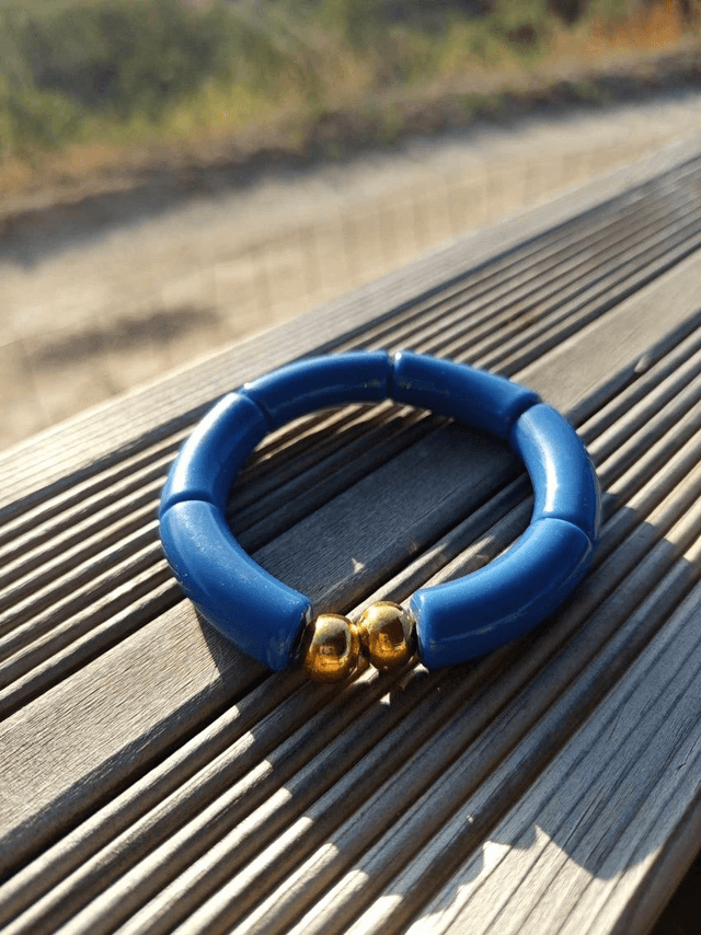 Bracelet perles tubes incurvées acryliques unies Khazaana Indigo