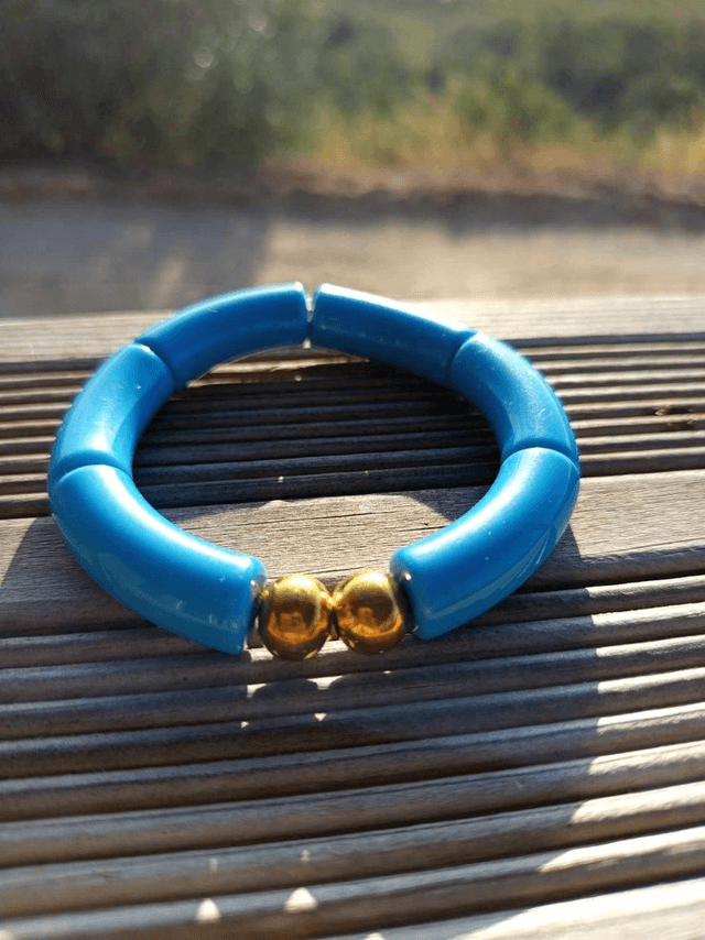 Bracelet perles tubes incurvées acryliques unies Khazaana Indigo