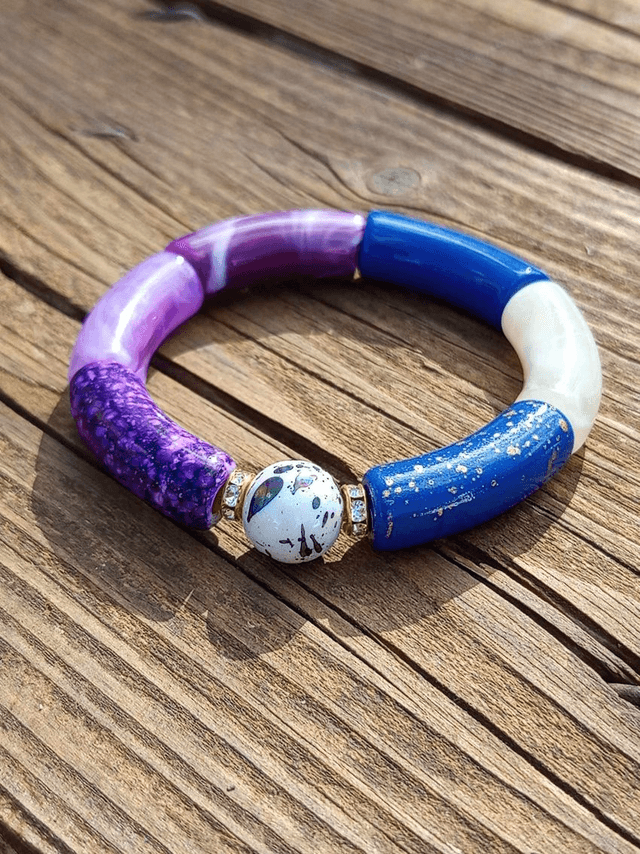 Bracelet perles tubes incurvées acrylique Uma Raaka